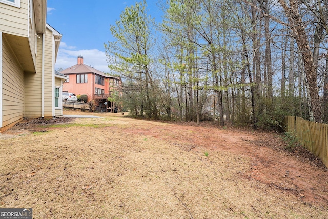 view of yard featuring fence