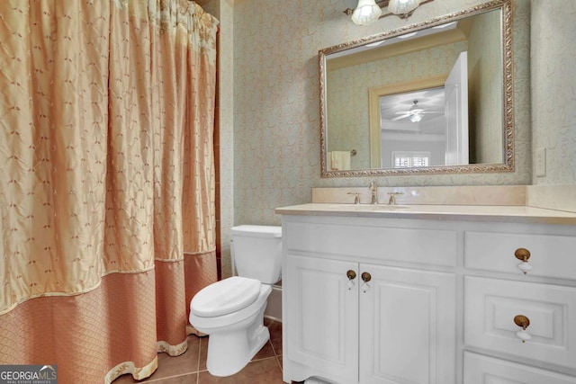 full bath with tile patterned floors, a shower with curtain, toilet, wallpapered walls, and vanity