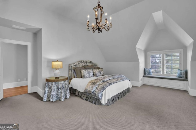 carpeted bedroom featuring baseboards and lofted ceiling