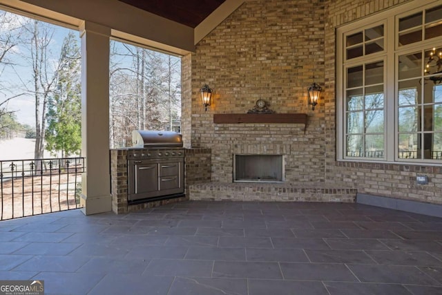 view of patio / terrace with area for grilling and an outdoor kitchen