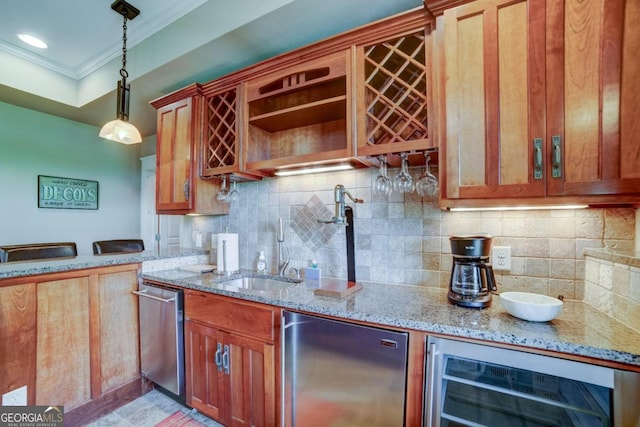 kitchen featuring wine cooler, crown molding, stainless steel appliances, a sink, and light stone countertops