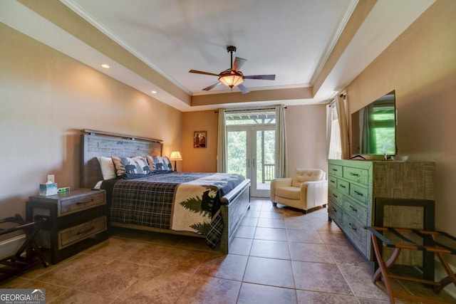 tiled bedroom featuring access to exterior, a tray ceiling, and crown molding