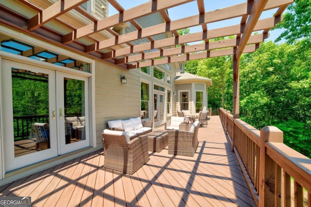 deck with an outdoor living space, a pergola, and french doors