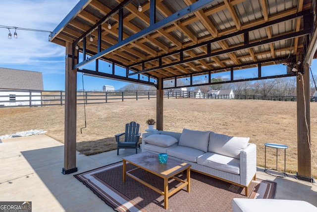 view of patio with fence and an outdoor living space