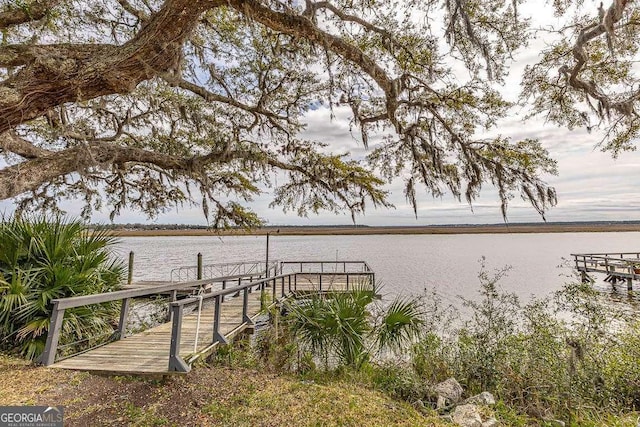 dock area featuring a water view