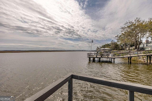 dock area featuring a water view