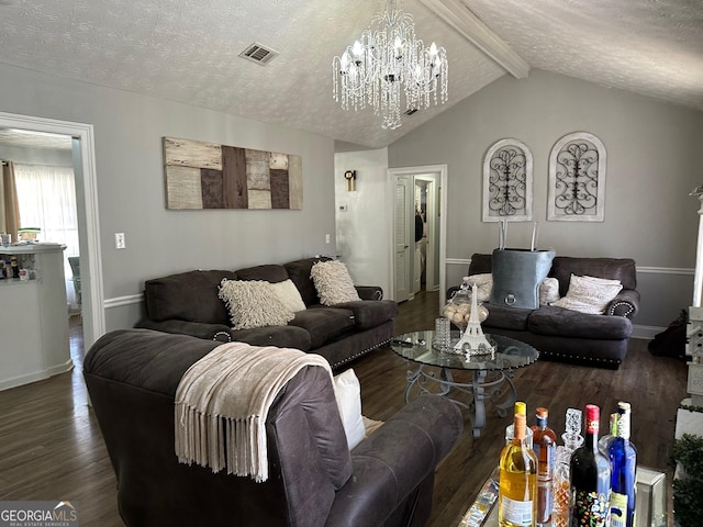 living room featuring vaulted ceiling with beams, an inviting chandelier, a textured ceiling, and wood finished floors