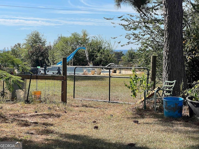 view of yard featuring fence