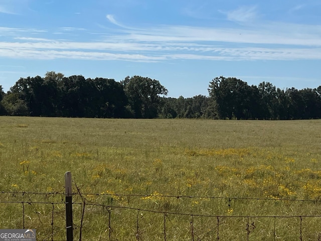 view of landscape with a view of trees and a rural view