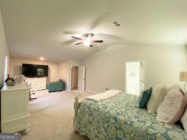 bedroom with vaulted ceiling, carpet floors, ceiling fan, and visible vents