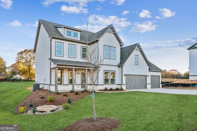 view of front of house featuring driveway, a garage, a porch, a front lawn, and board and batten siding