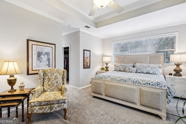 bedroom featuring a tray ceiling, visible vents, ornamental molding, carpet flooring, and baseboards