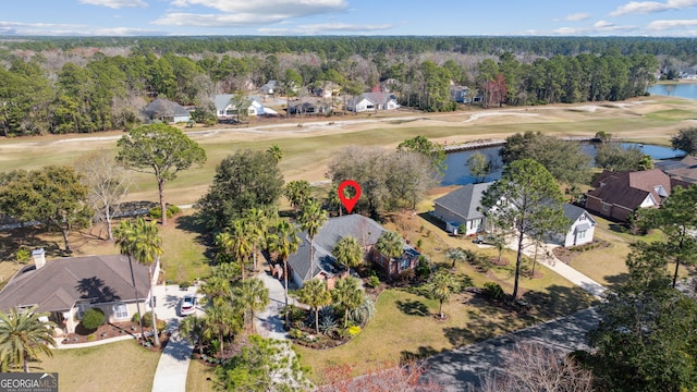 bird's eye view featuring a residential view, view of golf course, a water view, and a wooded view