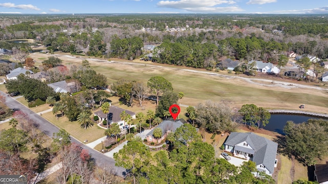 bird's eye view featuring a residential view and a water view