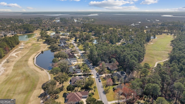 bird's eye view featuring a water view and golf course view