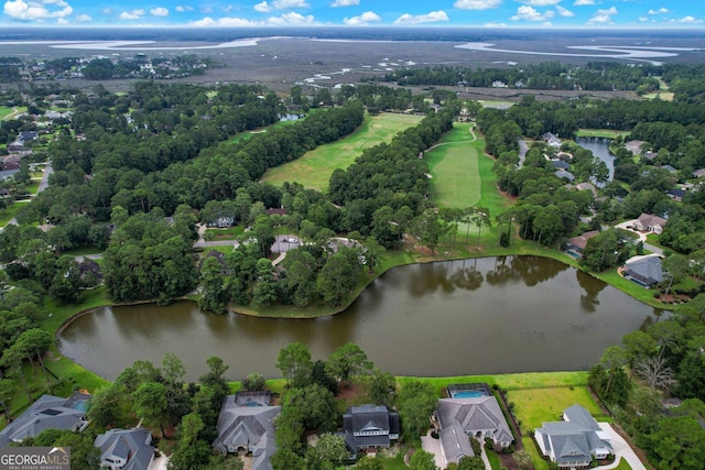 bird's eye view with a water view