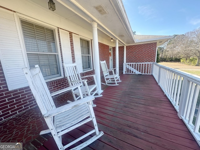 deck with covered porch