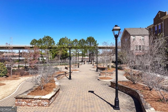 view of property's community with fence