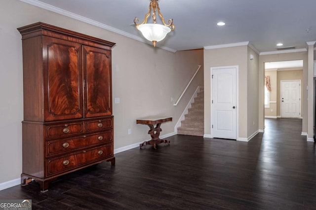 interior space featuring crown molding, stairs, baseboards, and dark wood-style flooring