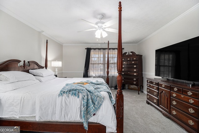 bedroom with a ceiling fan, light colored carpet, and crown molding