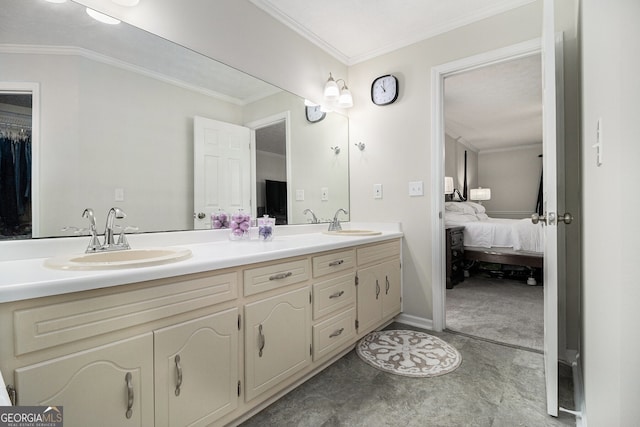 full bathroom featuring double vanity, ornamental molding, a sink, and connected bathroom