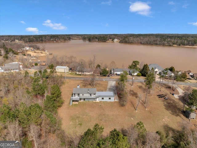 drone / aerial view with a water view