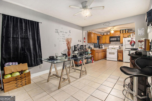 kitchen with light countertops, white appliances, a ceiling fan, brown cabinetry, and light tile patterned floors