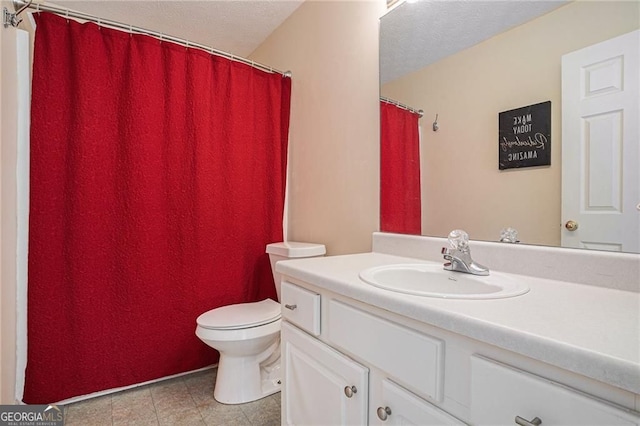 190 The Falls Blvd, Covington, GA 30016 - bathroom featuring vanity, toilet, a textured ceiling, and a shower with curtain