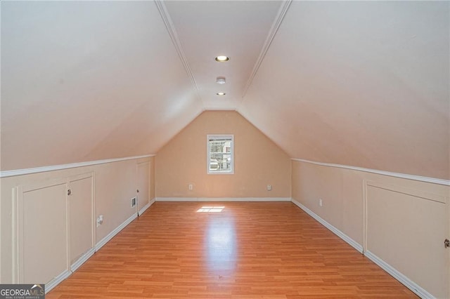 190 The Falls Blvd, Covington, GA 30016 - bonus room with light wood-type flooring, lofted ceiling, baseboards, and recessed lighting