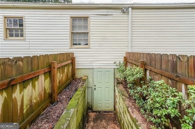 deck with a fenced backyard