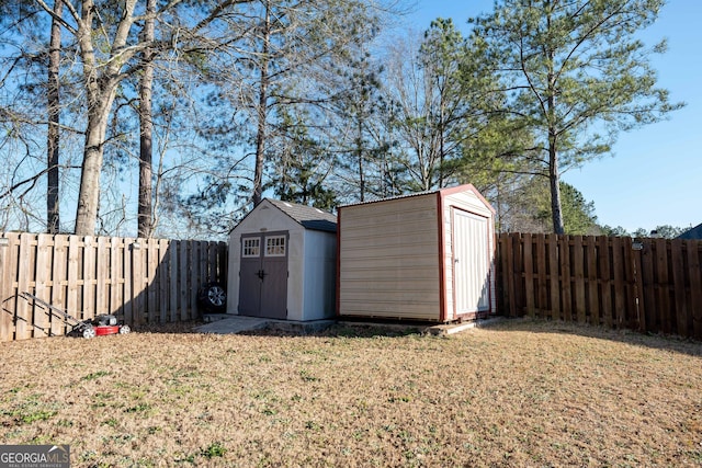 view of shed with a fenced backyard