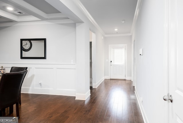 hallway with dark wood-style floors, beam ceiling, crown molding, recessed lighting, and baseboards