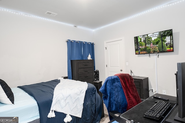 bedroom with visible vents