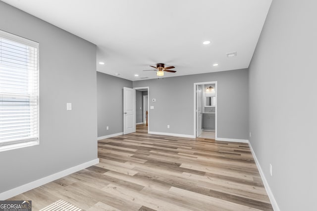 unfurnished room featuring visible vents, baseboards, ceiling fan, light wood-type flooring, and recessed lighting