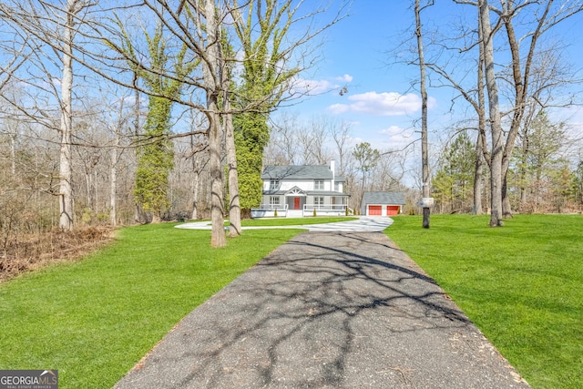 exterior space with aphalt driveway