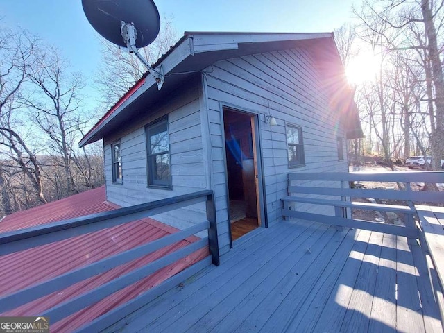 view of side of home featuring a deck