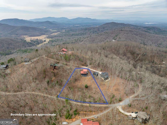 aerial view featuring a mountain view