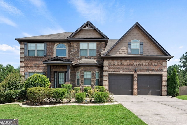 craftsman-style house with concrete driveway, brick siding, an attached garage, and a front lawn