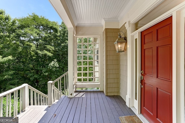 doorway to property featuring covered porch