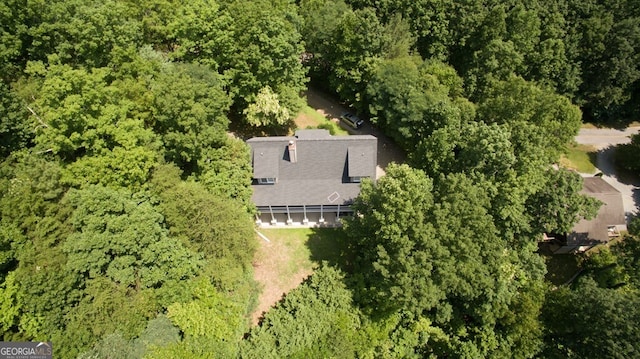 bird's eye view with a view of trees