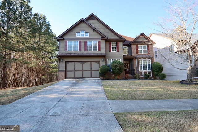 craftsman house featuring driveway, brick siding, an attached garage, and a front yard