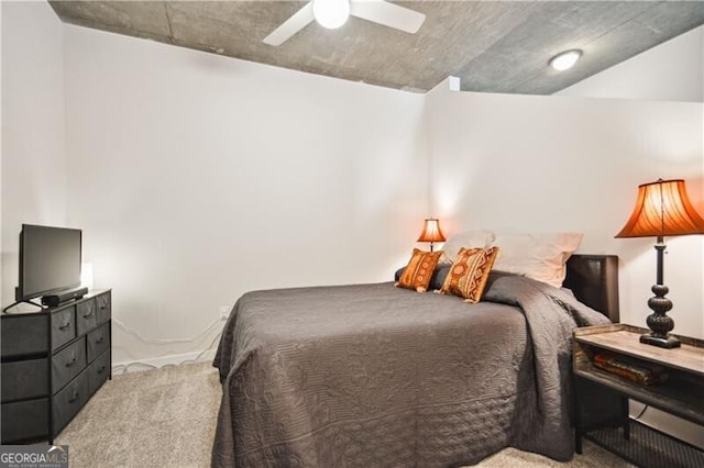 carpeted bedroom featuring a ceiling fan