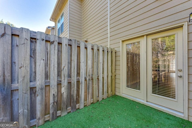 view of patio featuring fence