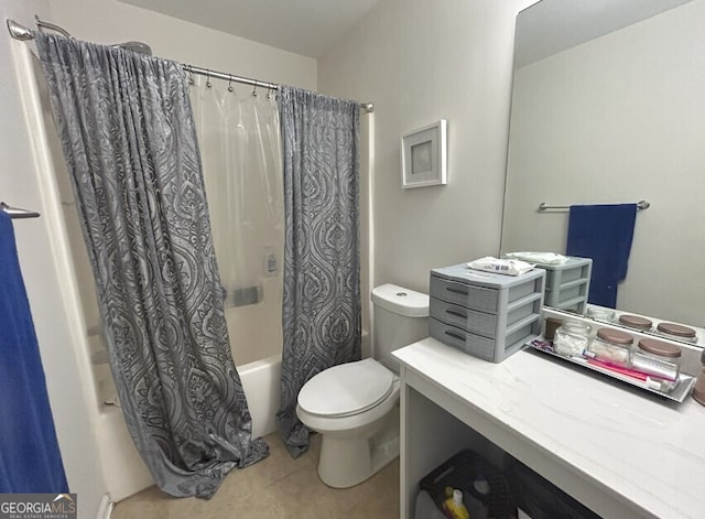 bathroom featuring toilet, tile patterned flooring, and shower / bath combo