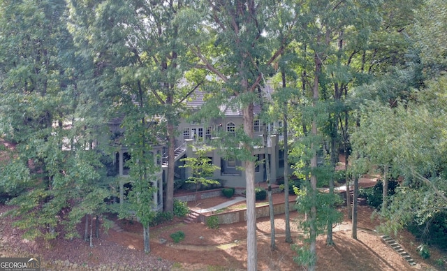 view of yard featuring stairs