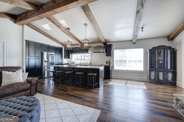 living room with an inviting chandelier, vaulted ceiling with beams, baseboards, and dark wood-style flooring