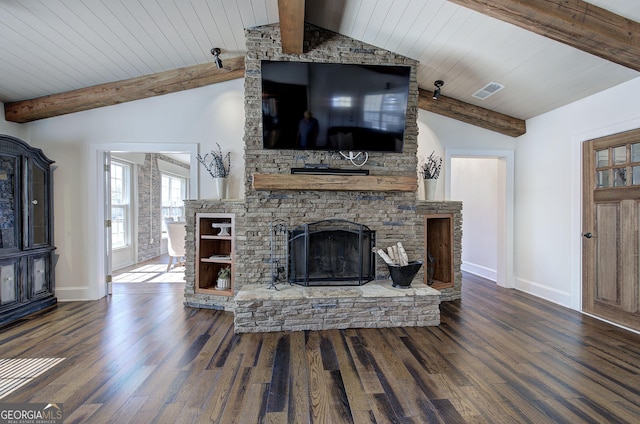 living room with a fireplace, lofted ceiling with beams, baseboards, and wood finished floors