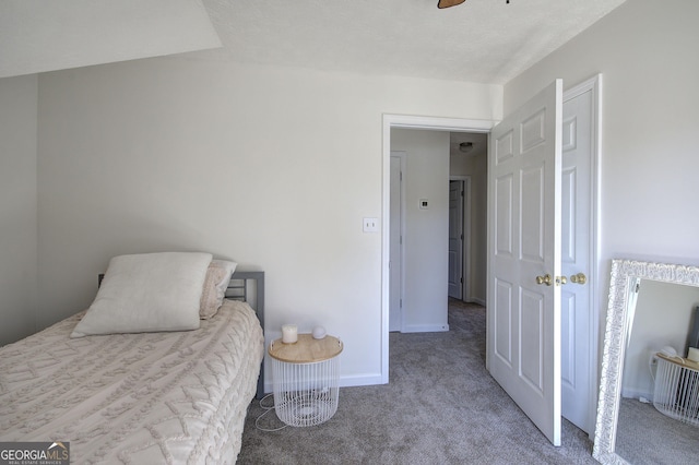 carpeted bedroom with baseboards