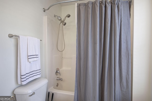 bathroom with toilet and shower / bathtub combination with curtain