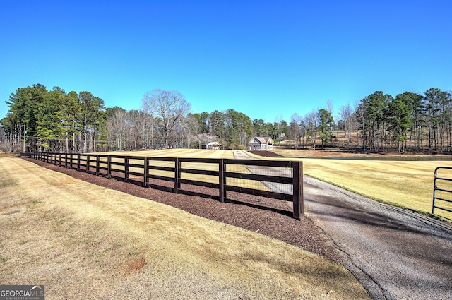 view of gate featuring fence